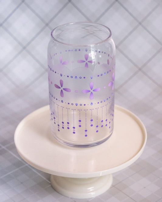 Glass cup with a design pattern of dots