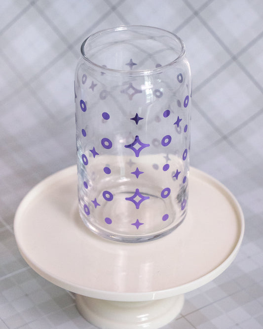 Glass can cup with 4 point star shaped purple vinyl